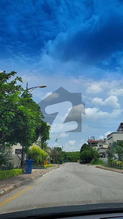 8marla corner boulevard back open 2 said open plot for sale with 3marla extra land not paid in sector j