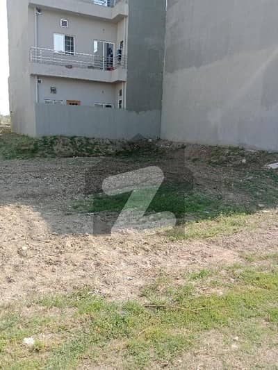 A Beautiful 5 Marla Plot Is Available For Urgent Sale In *Etihad Town Phase 1*, Main Raiwind Road, Lahore, Directly Facing The Park.