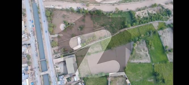 162 marla second commercial plot available for sale on main nasir bagh road near to ring road and near to northern  bypass demand per marla 20 lack school  university hospital wedding hall ke leye achi jagga hai