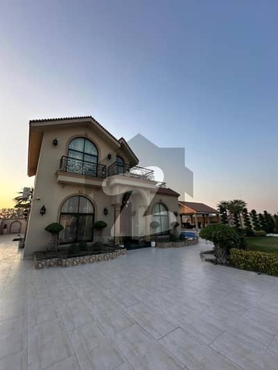 FULLY FURNISHED 4 KANAL SPANISH STYLE FARMHOUSE WITH POOL, GAZEBO WITH HUGE GARDEN AND EXPENSIVE PLANTS.