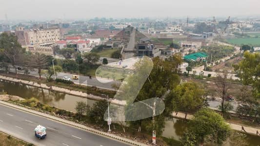 2.5 Marla Commercial Plot For Sale in Raya Canal Faisalabad Near Babu CNG 2, City Walk, Market Place 204, Gatalwala