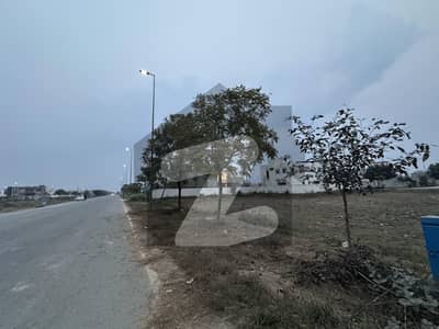27 Marla Plot For Sale On 70'Ft Wide Road Near Main Park Phase 8 Lahore