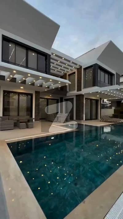 ڈی ایچ اے فیز 7 - بلاک آر فیز 7,ڈیفنس (ڈی ایچ اے),لاہور میں 5 کمروں کا 1 کنال مکان 6.0 کروڑ میں برائے فروخت۔