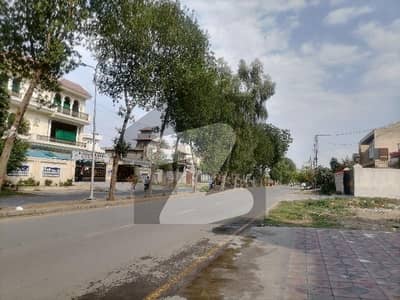 Prime Location 1 Kanal Commercial Plot Is Available On 80 Feet Main Road - Ideal For School Or Bank