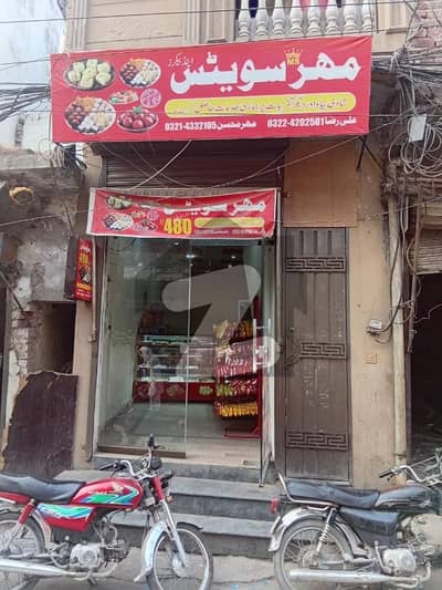 commercial shop with flat for sale in peer colony Walton road Lahore