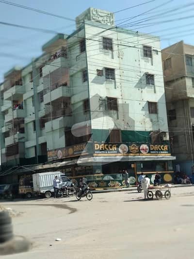 2 bed Drawing Dining flat for sale in Gulshan-e-Iqbal block 6 Eastern Apartments main road facing west open corner apartment