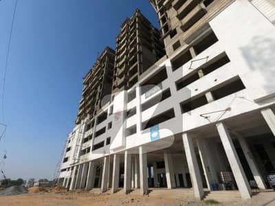 Showroom Available on Installments Double 18 feet Height on 244 Feet Main Road Scheme 33