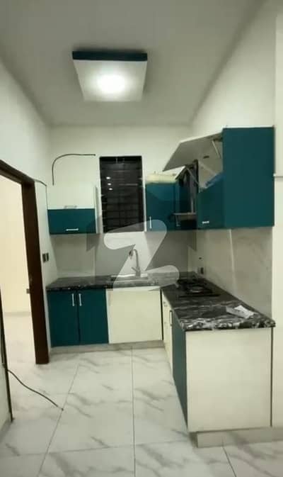 Centrally Located Flat In   Nishat Commercial Area Is Available For sale