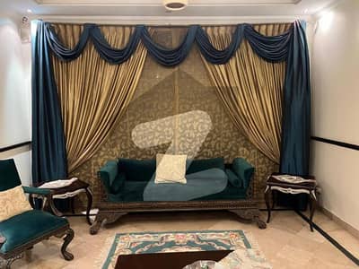 Elegant 1-Kanal Fully Furnished Modern Elevation House for Sale in DHA Lahore Phase 4 Block AA 4-Master Beds, 2 Kitchens, 2 TV Lounges, Prime Location with A+++ Construction