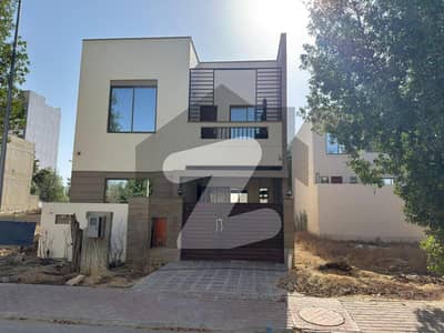 125 Sq Yd Ready-to-Move Luxury Villa For Sale Precinct 11B, Bahria Town Karachi A+ Construction | 3 Bedrooms, Drawing, Dining, TV Lounge & American Kitchen 10 Min from Main Gate | Near Park, Mosque, Schools & Commercial.
