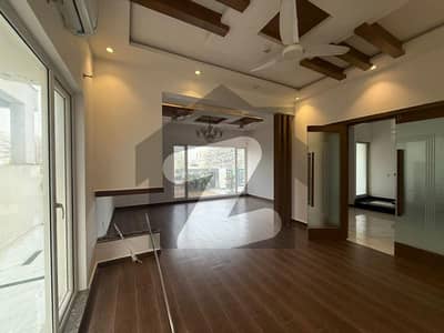 BRAND NEW SEMI FURNISHED WITH SOLAR AND ACS 1-KANAL ELEGANT AND FULLY MAINTAINED SUPER HOT LOCATED BUNGALOW IS AVAILABLE IN THE BEST BLOCK OF PHASE 7BNEAR RAYA DHA LAHORE.