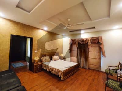 PHASE 6 2-KANAL BRAND NEW FULL BASEMENT FULLY FURNISHED BUNGALOW WITH SWIMMING POOL AND HOME THEATRE IS AVAILABLE FOR SALE.