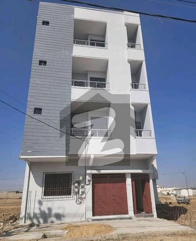 BUILDING FOR SALE IN SCHEME 33 ( ALI GHAR SOCIETY)