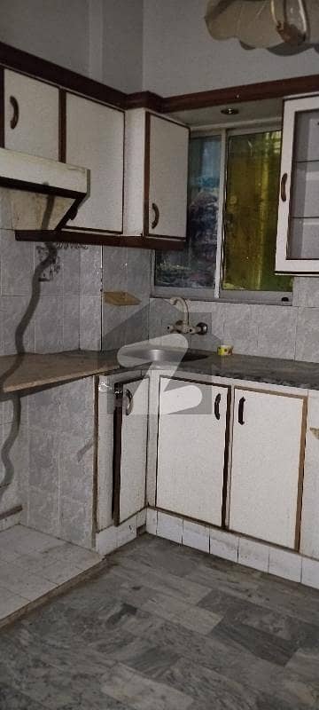 3 Bed DD Apartment For Sale Gulistan-E-Johar Block 17 Location: Iqra Complex, Phase 1, Block 17, Gulistan-E-Johar Opposite Perfume Chowk Ground Floor (Ideal For Families & Elderly)