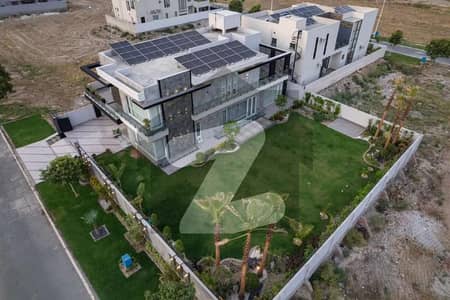 1KANAL LOWN+1KANAL HOUSE ULTRA MOLDERN FULL BASEMENT FULLY FURNISHED SWIMMING POOL HOME THEATRE AT A PRIME HOT LOCATION FOR SALE