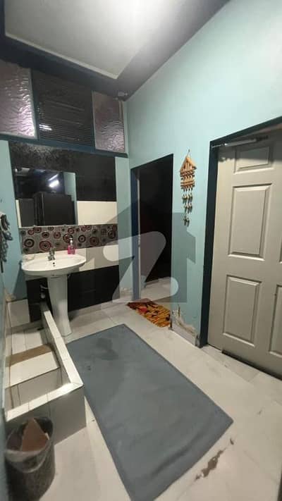 next to main shara e qaideen PECHS block 2 back side Hassan zai koila karahi 200 sq yards Ground floor portion