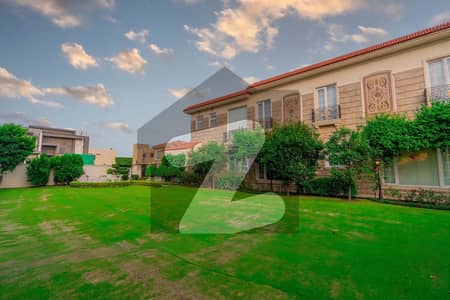 1Kanal Lown+1Kanal Royal Spanish Banglow Very Hot favourites Location Walking Distance Raya For Sale