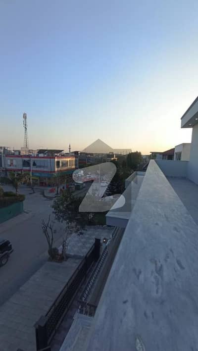 14 Marla corner House for sale ideal location G13/4 70 fit road pindi facing nearly Kashmir highway Islamabad