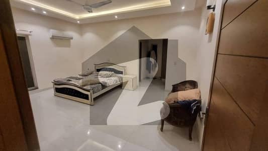 1 Kanal Luxury tile floor 3bed upper portion (lower locked) in wapda town E-1 block independent