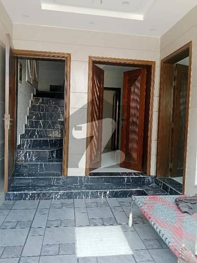 Features 5 Marla Brand New House for Sale in Etihad Town Phase 1  Main Raiwind Road, Lahore 5 Spacious Bedrooms with Attached Bathrooms Modern Kitchen with Stylish Cabinets TV Lounge & Drawing Room Dining Area Beautiful Tile Flooring Solid Wooden Doors Car Porch Laundry Area Terrace / Rooftop Space Gas, Electricity & Water Available Near to Main Road, Park, Mosque & Commercial Market Secure & Peaceful Environment