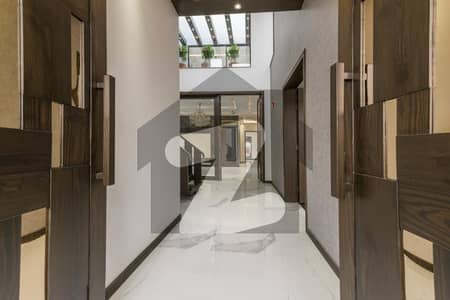 D H A Lahore 1 Kanal Brand New Mazhar Munir Design House With 100% Original Pics Available For Rent