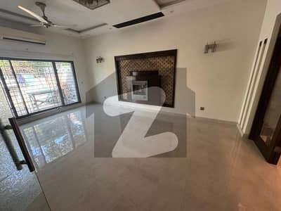 1 Kanal Tile Flooring House for Rent in Johar Town Lahore.