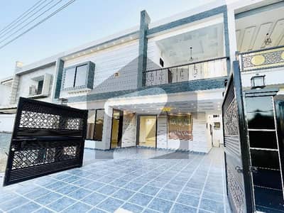 Park facing 10 Marla House near to main boulevard near to market and commercial