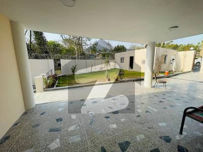 E-7 LIKE A BRAND NEW 04 Bedroom COMPACT House With Beautiful Garden For Rent