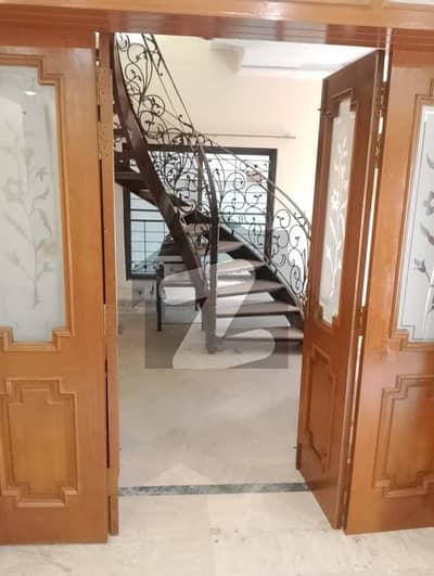 10 Marla Beautiful House Available on rent at hot location of DHA Phase 1