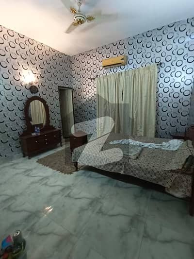 Spacious 10 Marla House on 60 Feet Road for Rent in C Block Faisal Town Lahore