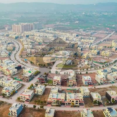 SECTOR C1 10 MARLA BACK OPEN SOLID LAND POSSESSION UTILITY PAID PLOT FOR SALE