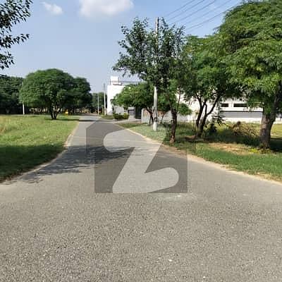 Prime Location 30 Marla Main Road Plot DP Clear & Ready to Build Ideal For Investment