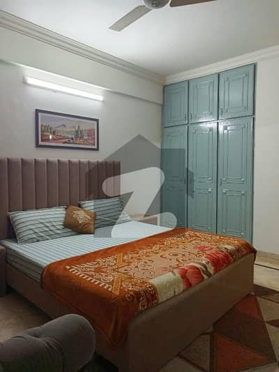 E11 3 furnished 2bed inverter ac wabda meater lift parking for bachelor or family