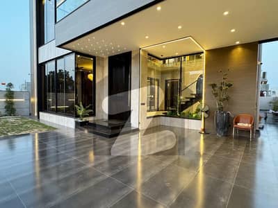 Elegant 1-Kanal Brand New Designer House for Rent in Prime DHA Phase 7 Lahore 5 Master Bedrooms, Modern Kitchens, Lush Green Lawn & Premium Living Experience