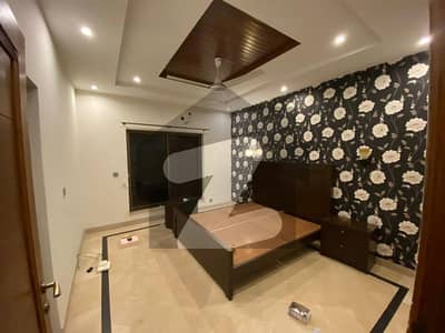 10-Marla Elegant Upper Portion for Rent in DHA Lahore Phase 4 Prime Location, Modern Design, 2 Master Bedrooms with Attached Baths, Marble Flooring & Spacious Living Areas Easy Access, Reasonable Rent 90K (Negotiable) Wall Green Realtors