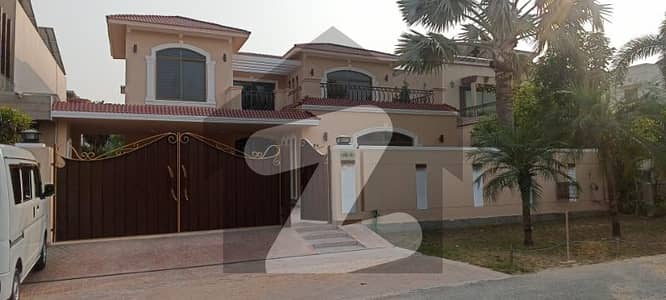 1-KANAL ELEGANT AND FULLY MAINTAINED SUPER HOT LOCATED BUNGALOW IS AVAILABLE IN THE BEST BLOCK OF PHASE 5 DHA LAHORE.