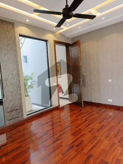 Own a 10-Marla Modern Luxury Bungalow in DHA Lahore Phase 7 Block Y 4-Master Bedrooms, 2 Stylish Kitchens, Spacious Drawing & Dining, Terrace & Independent Access Prime Location with Easy Deal by Buttar Estate & Groups