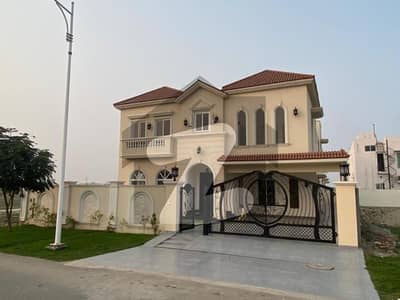 20 MARLA ELEGANT AND FULLY MAINTAINED 4 YEAR OLD SPNISH DESIGN SUPER HOT LOCATED BUNGALOW IS AVAILABLE IN THE BEST BLOCK OF DHA LAHORE.