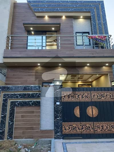 3 Marla double story house fr sale brand new home ideal and hot loction carpet road water electricity available 3D ultra model design Spanish look furnished home with wood work gated society 24 hour security guard near sozo water park near canal road facing park house luxury house