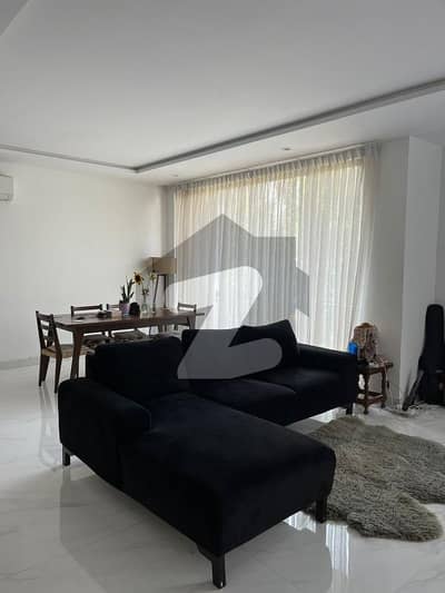 Spacious 2 Bedroom Apartment for Rent in Gulberg III Pool, Parking & Rooftop Access