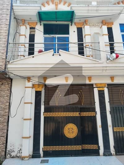 3.5 Marla double story house fr sale brand new home ideal and hot loction carpet road water electricity available 3D ultra model design Spanish look furnished home with wood work gated society 24 hour security guard near sozo water park near canal road