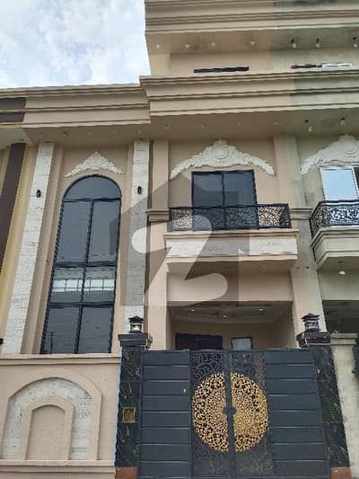 4 Marla double story house fr sale brand new home ideal and hot loction carpet road water electricity available 3D ultra model design Spanish look furnished home with wood work gated society 24 hour security guard near sozo water park near canal road near park luxury house