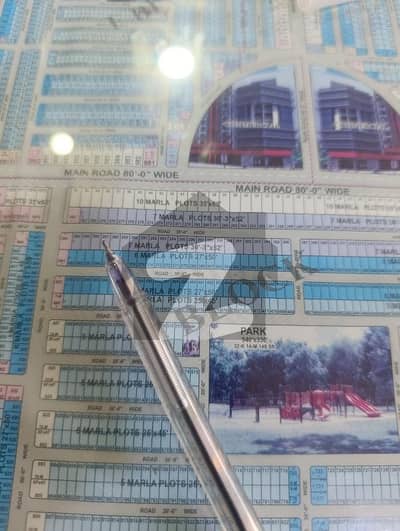 O Block 7Marla plot super hot location Back to main 80ft road Al Rehman Garden phase2