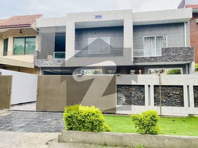 New Modern, Double-Storey House on 70ft Road, near G11 Markaz , Double Road Back , with 2 parks , Servant quarter. CDA Transfer