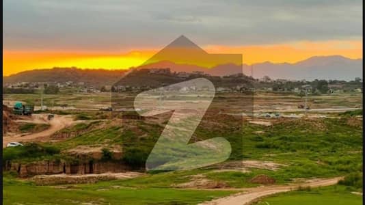 Own A 10 Marla Residential Plot In Margalla Enclave Islamabad, A Premium Housing Project Developed As A Joint Venture Of Capital Development Authority (CDA) And Defence Housing Authority (DHA).