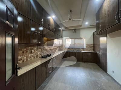 Elegant 1-Kanal Double Unit House For Rent in DHA Phase 7, 6 Master Bedrooms with Attached Bathrooms, 3 Kitchens, TV Lounges, Drawing & Dining, Store Room, Powder Room Perfect Family Home Easy Deal by Wall Green Realtors