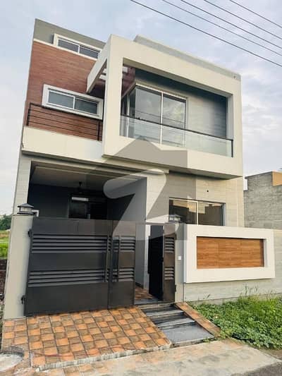 5 Marla double story house fr sale brand new home ideal and hot loction carpet road water electricity available 3D ultra model design Spanish look furnished home with wood work gated society 24 hour security guard near sozo water park near canal road near park 5 Marla double story house fr sale brand new home ideal and hot loction carpet road water electricity available 3D ultra model design Spanish look furnished home with wood work gated society 24 hour security guard near sozo water park near canal road near park