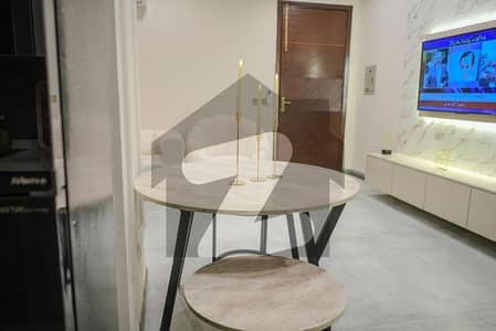 Beautiful 2-bedroom luxury apartment available on Main Boulevard, Gulberg Greens Islamabad. The apartment offers a stunning farmhouse-facing view and comes with A+ quality furnishing, providing a comfortable and elegant living experience. Perfect location with easy access and a peaceful environment.