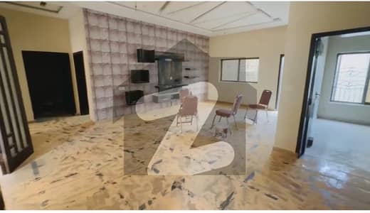 10 Marla Tile flooring Super Hot Location Near Emporium,Canal All Original Picture Direct Meeting Available For Sale in Johar Town phase 2.