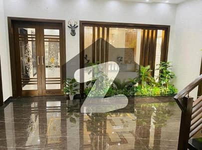 A BEAUTIFUL 1 KANAL SINGLE STOREY HOUSE FOR RENT IN OVS B BAHRIA TOWN LAHORE